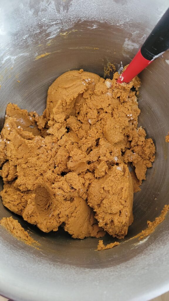 A process shot of old fashioned molasses cookie dough after all ingredients have been added