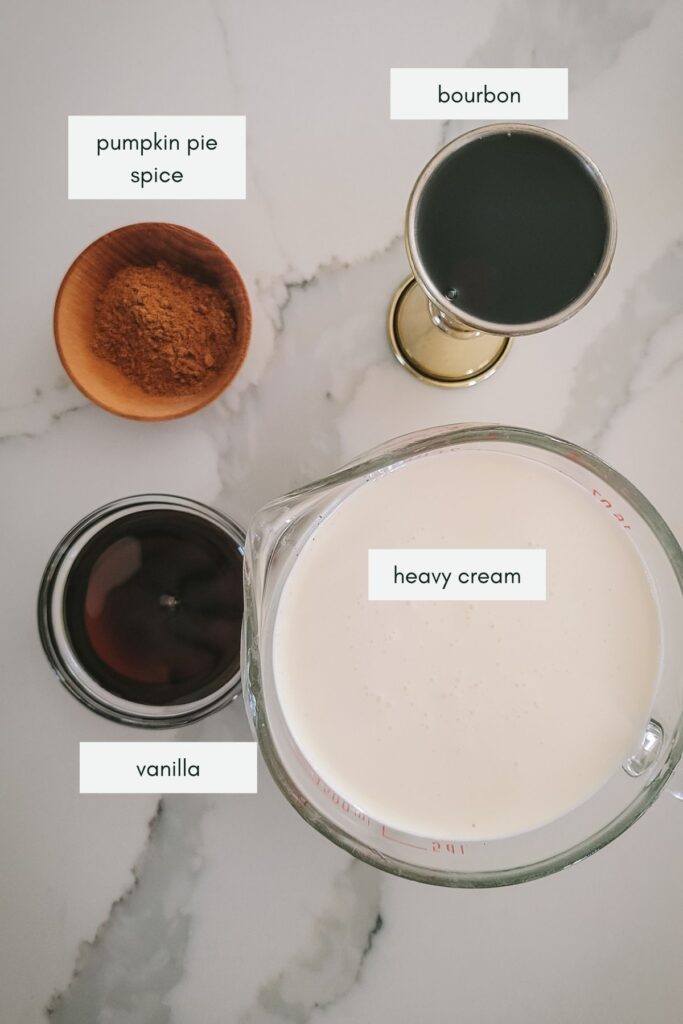 Ingredients for the whipped cream, including spices, bourbon, maple syrup and heavy cream.
