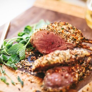 Herb crusted rack of lamb with mint and white wine.