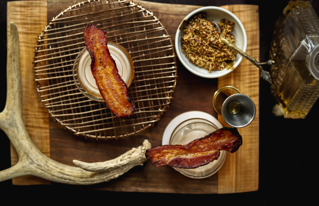 This maple mustard candied bacon is so sweet, savory, salty, and just the most delicious bite of food.