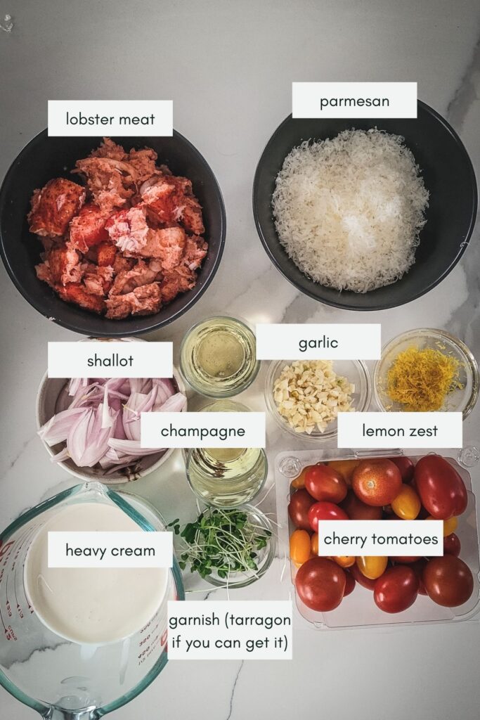 A photo showing lobster meat, parmesan cheese, shallot, champagne, garlic, lemon zest, heavy cream and cherry tomatoes