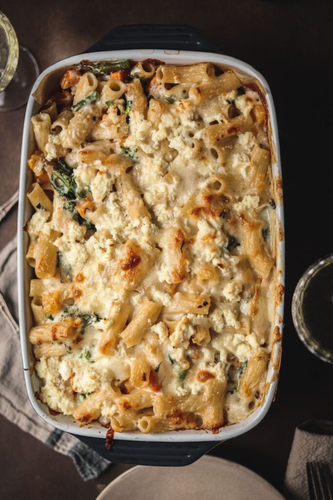 A photo of baked bechamel pasta in a 9x13" pan