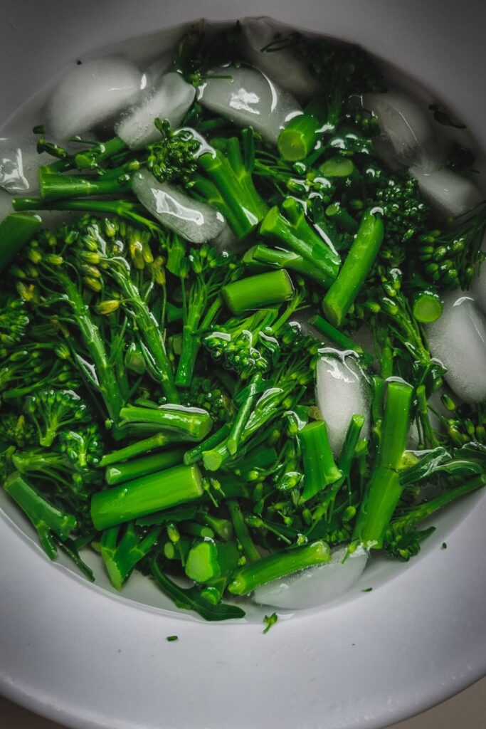 Broccolini in an ice bath