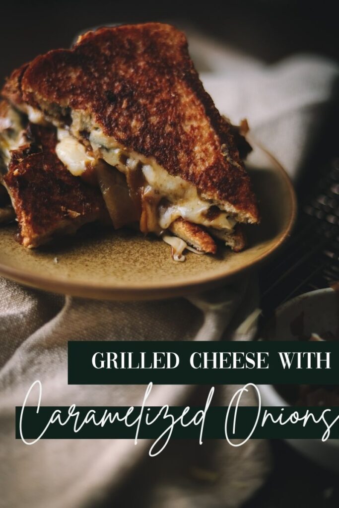 A photo of triple decker grilled cheese with caramelized onions