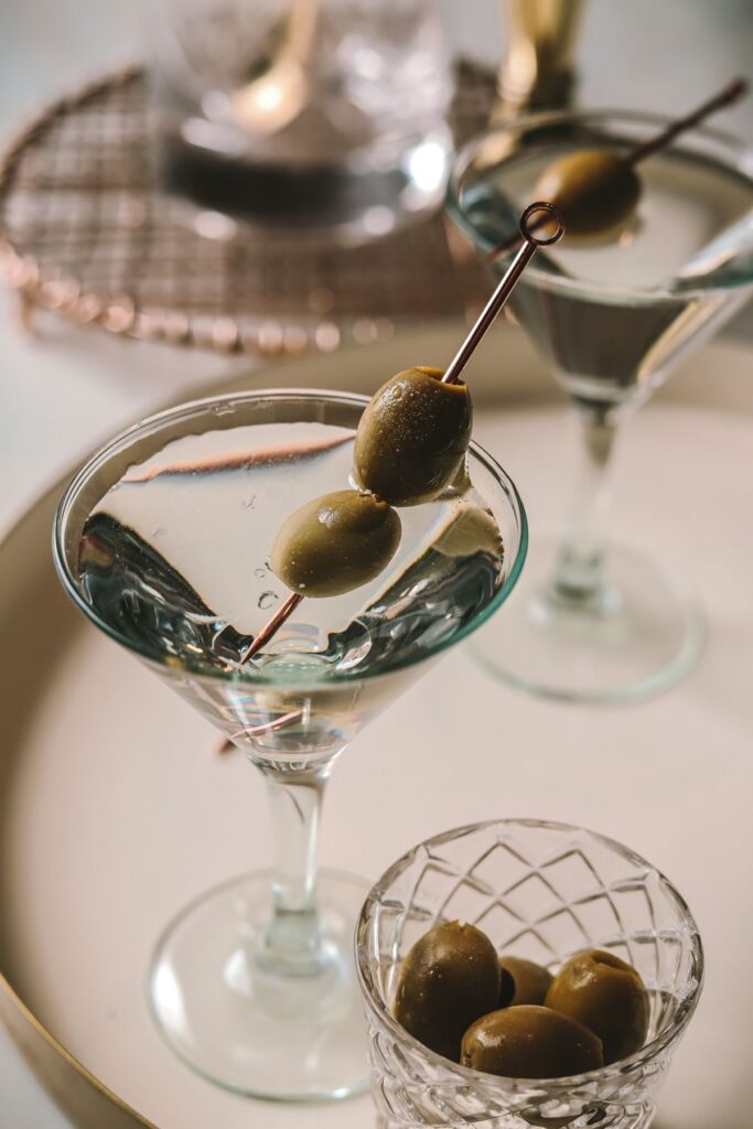 two dry martinis with olives