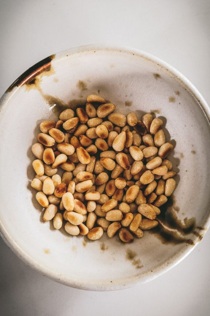 A bowl of toasted pine nuts