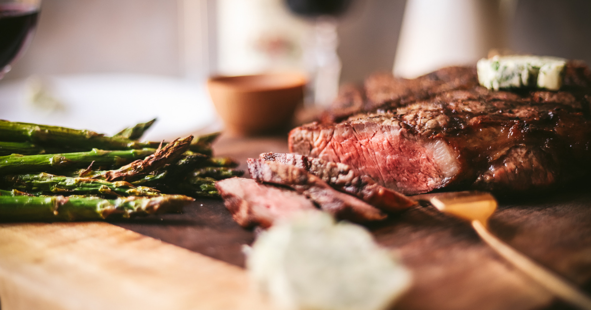What is the recommended grilling time for a 1Â½ inch T-Bone steak for medium-rare doneness?
