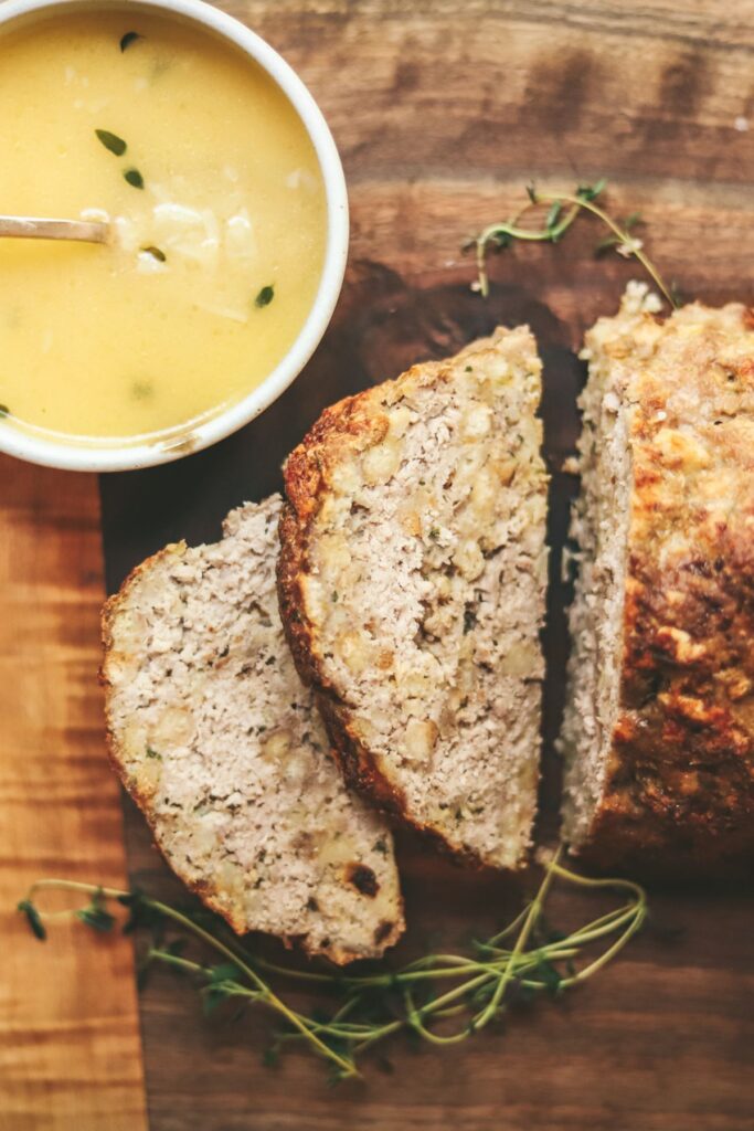 Meatloaf made with stuffing and garlic butter sauce. 