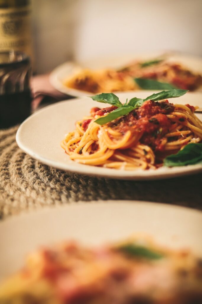 A side shot of a plate of pasta from the tv show the bear, also known as spaghetti pomodoro