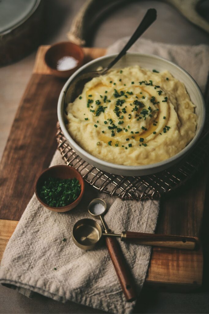 Mashed potatoes with chives and butter.