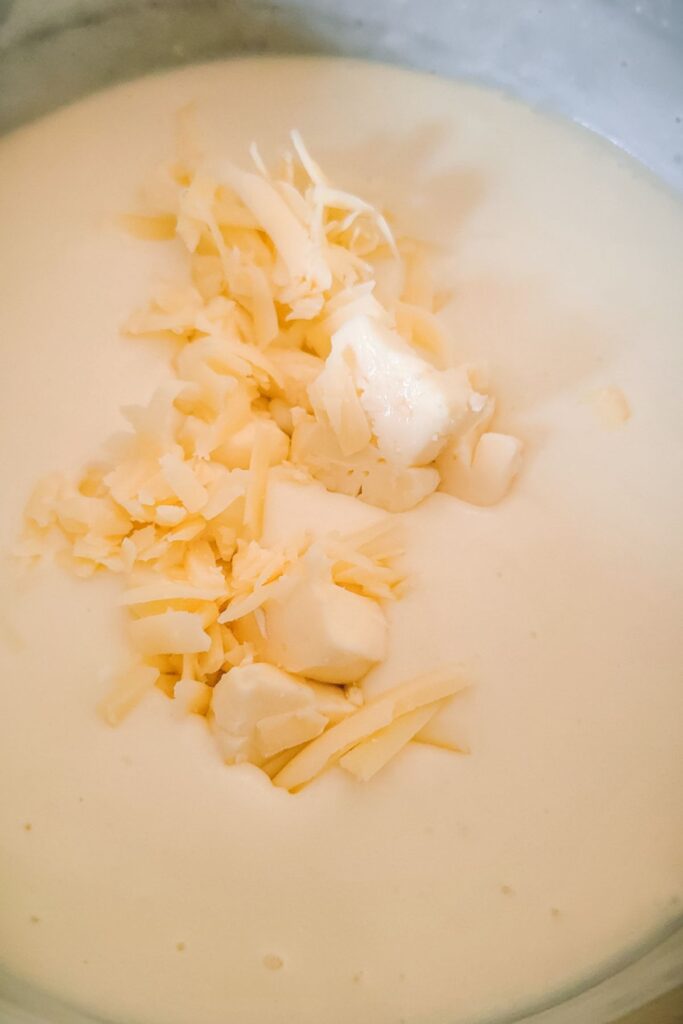Cheese added to the béchamel sauce.  