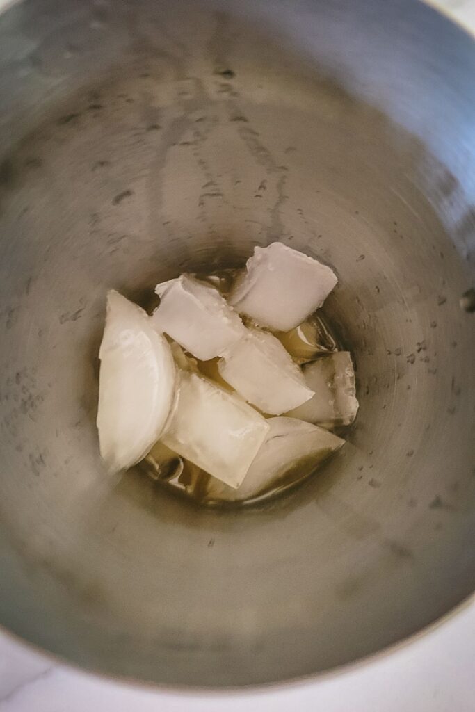 The first ingredients in a Boston Shaker with Ice