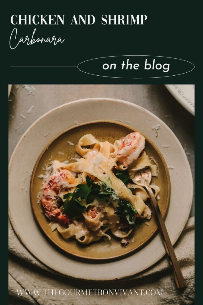 Plate of chicken and shrimp carbonara on dark green background with title text.