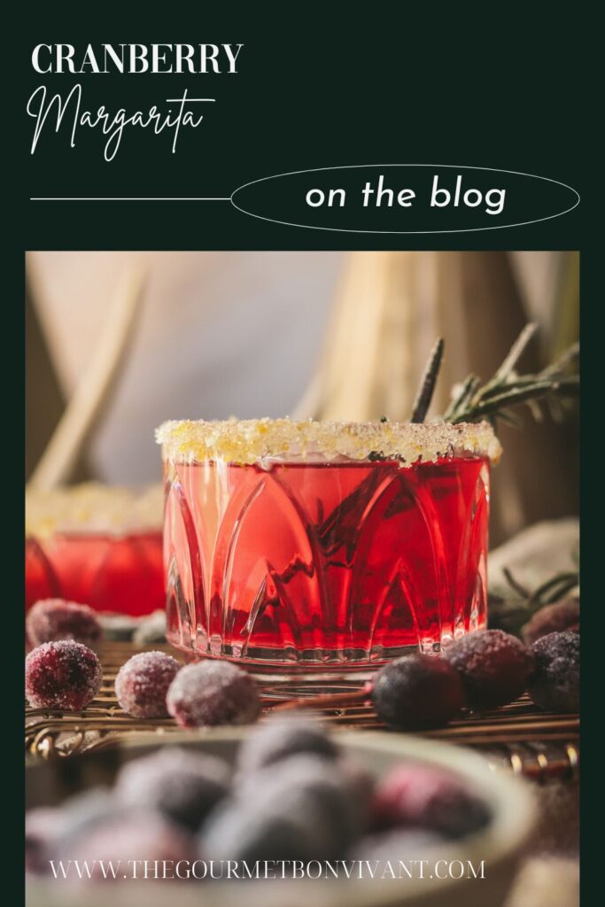 Three cranberry margaritas with rosemary and title text on dark green background..