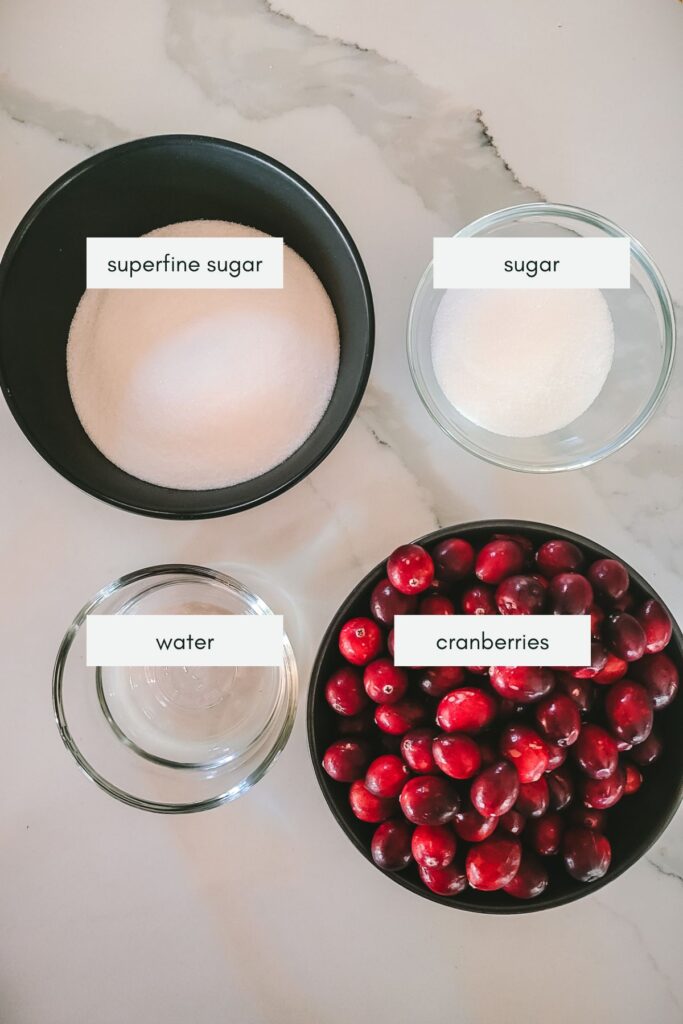 Ingredients for sugared cranberries with labels.