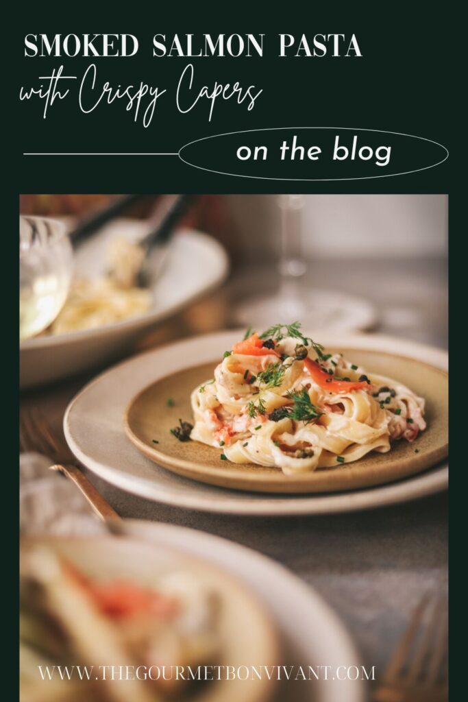 A plate of smoked salmon pasta, dark green background, title text.