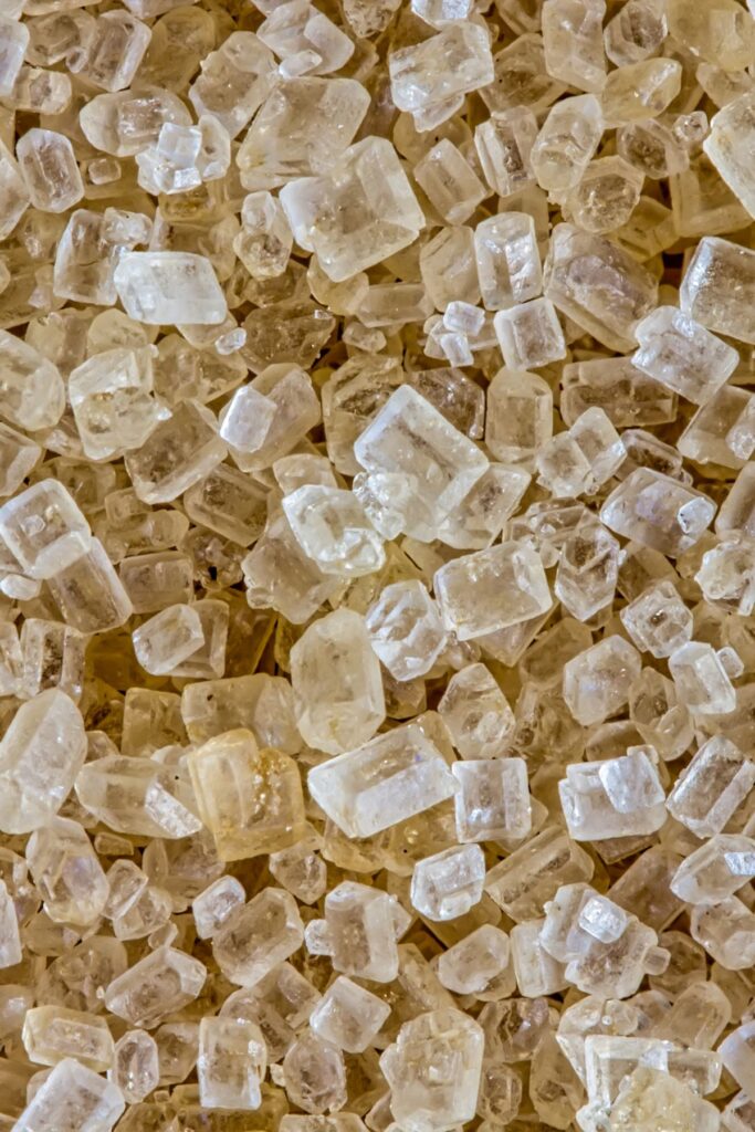 A close up photo of demerara sugar crystals.