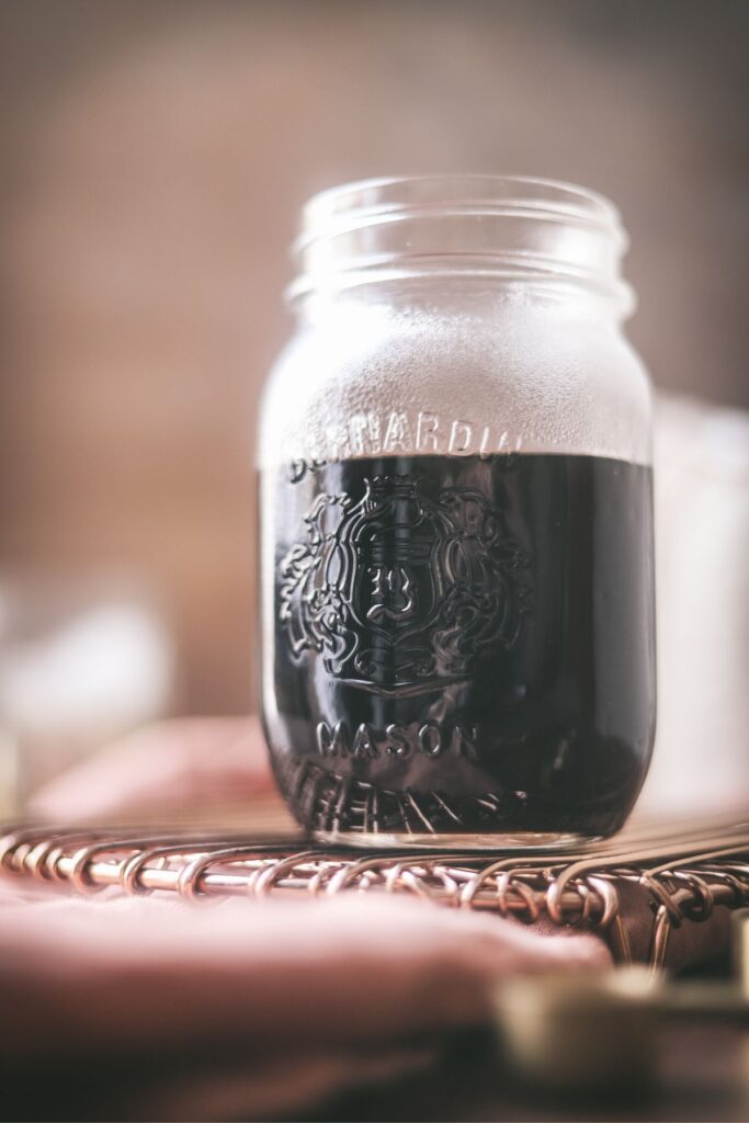 A jar filled with demerara syrup. 
