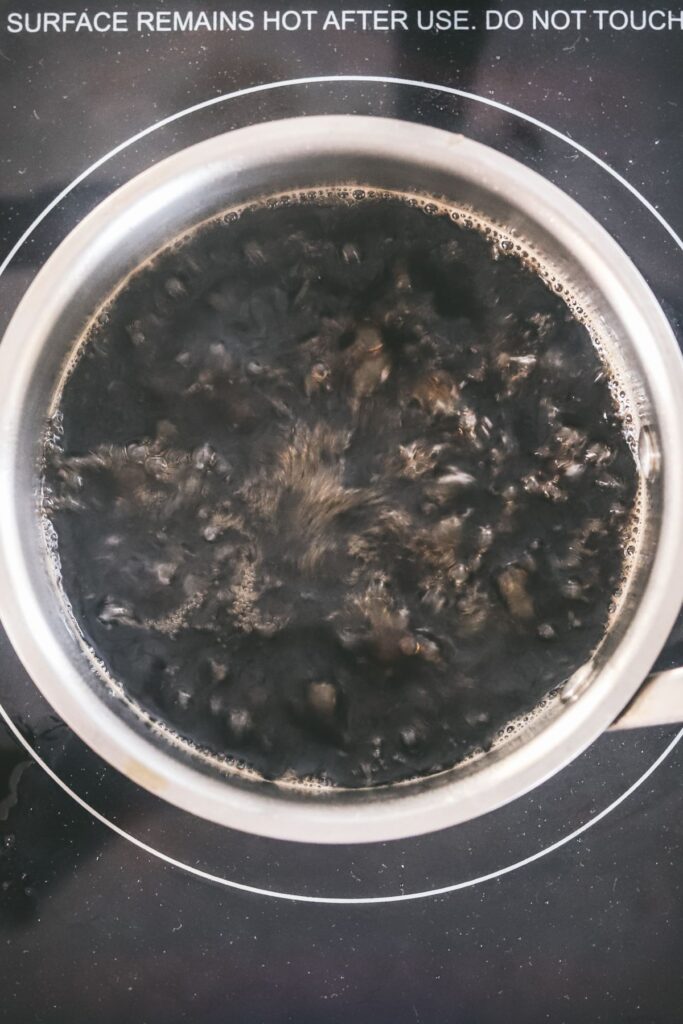 The demerara syrup simmering in the pot. 