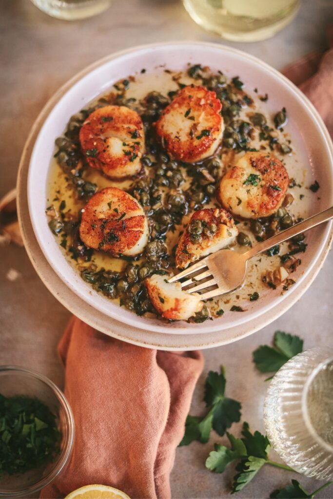 Seared scallops with lemon butter and capers. 