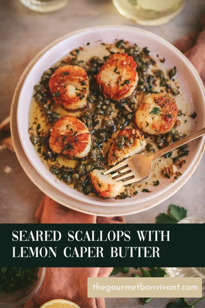 Seared scallops with golden crust, surrounded by white wine, lemon and parsley - title text included.