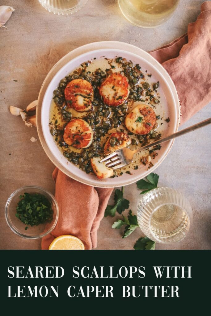 Seared scallops with golden crust, surrounded by white wine, lemon and parsley - title text included.