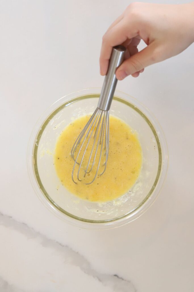 Eggs, cheese, and pepper whisked together. 