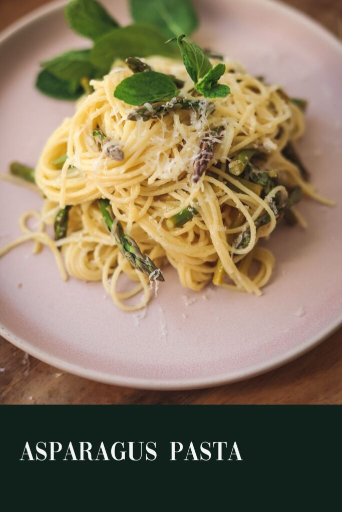 Asparagus and lemon pasta garnished with mint, title text.