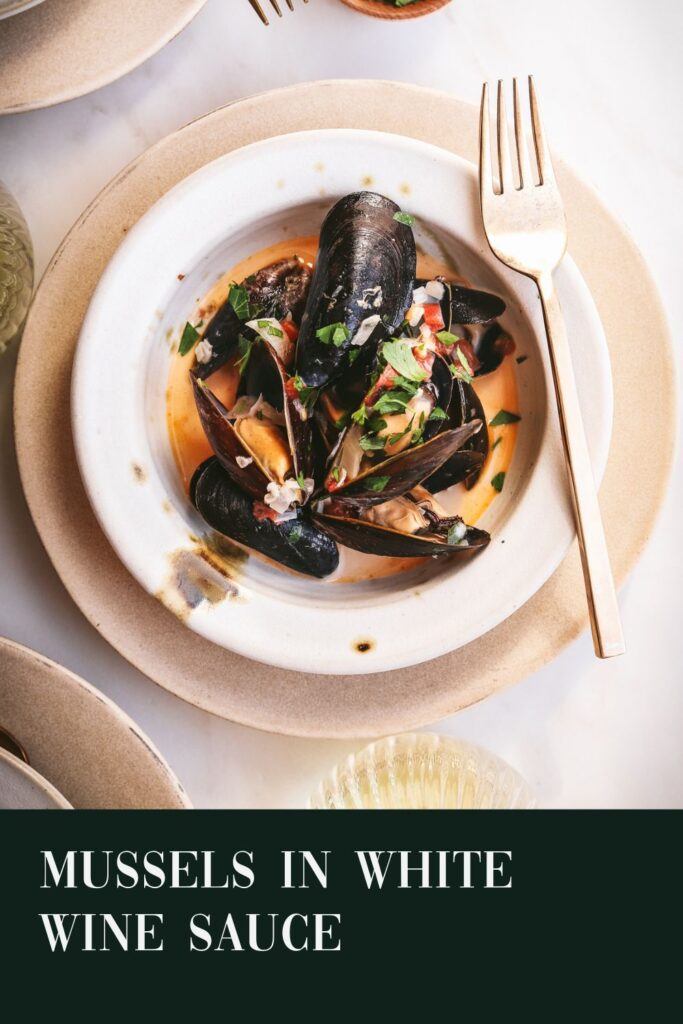 Mussels in white wine sauce with parsley and white wine, with title text.