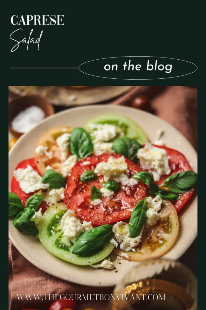Caprese salad with basil and mozzarella and cherry tomatoes with title text.