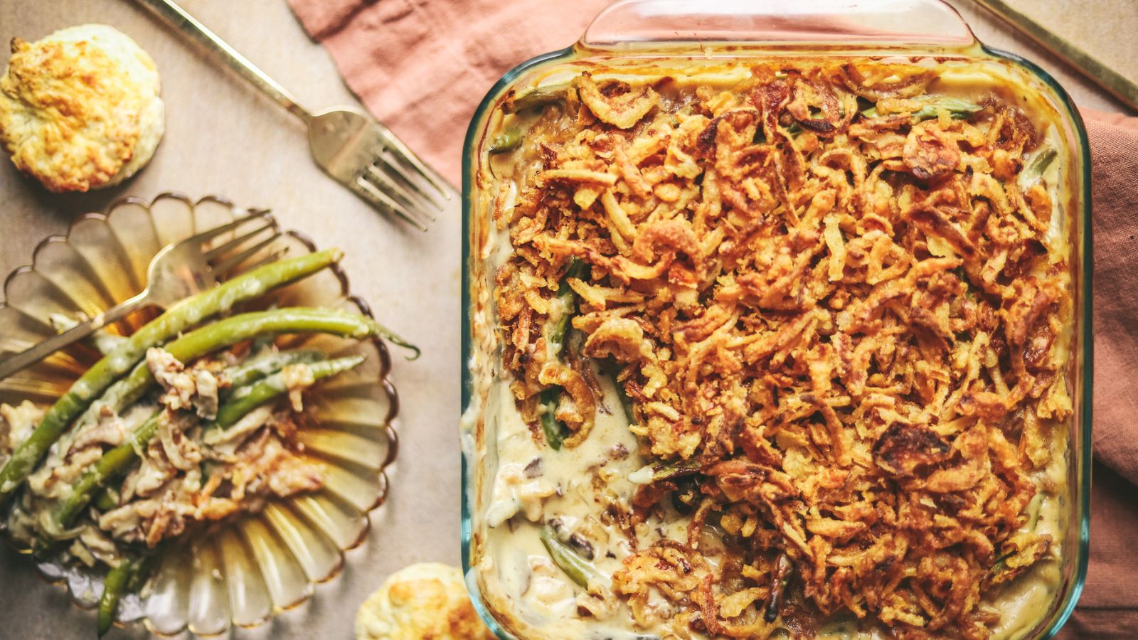 A green bean casserole covered in crispy onions. 