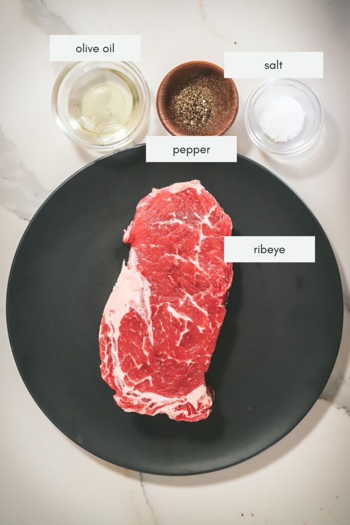 Ingredients for a grilled ribeye steak. 