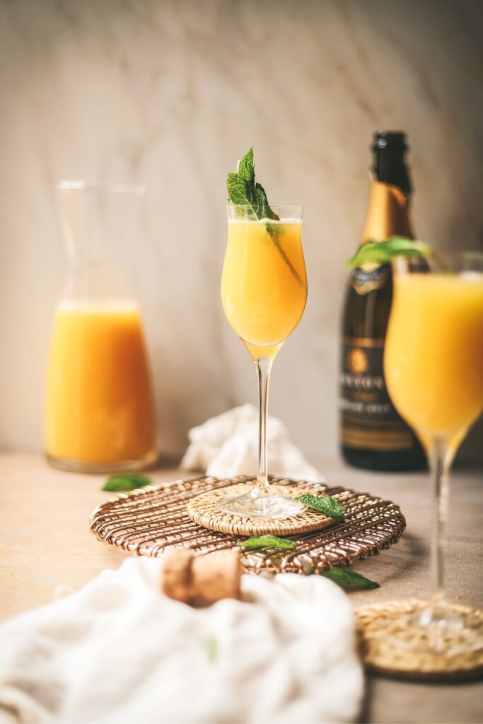 Non-alcoholic mimosas with mint. 