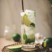 A virgin mojito with lime mint and ice.