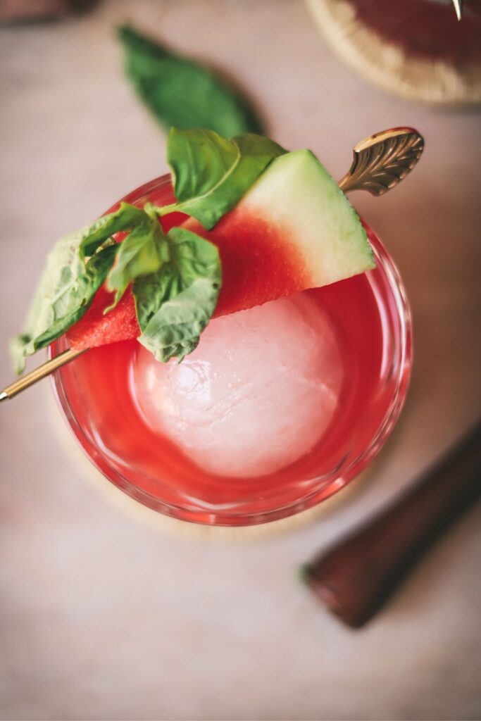 A watermelon vodka cocktail with basil and fresh watermelon. 