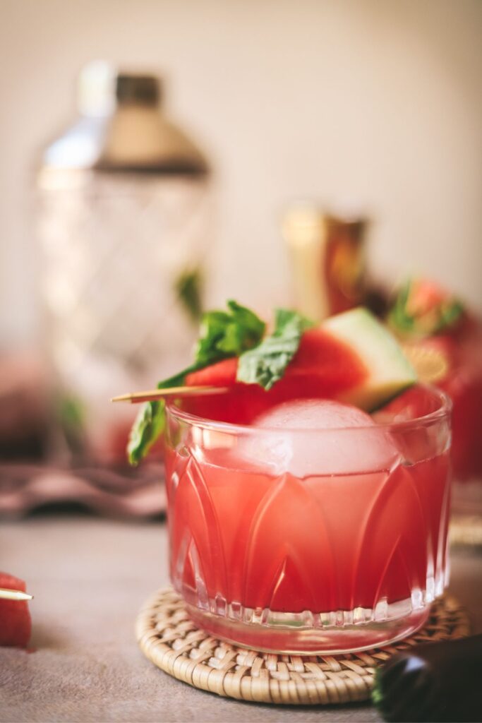 A watermelon and vodka cocktail with basil and watermelon. 