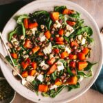 Butternut squash salad with brie and candied hazelnuts.