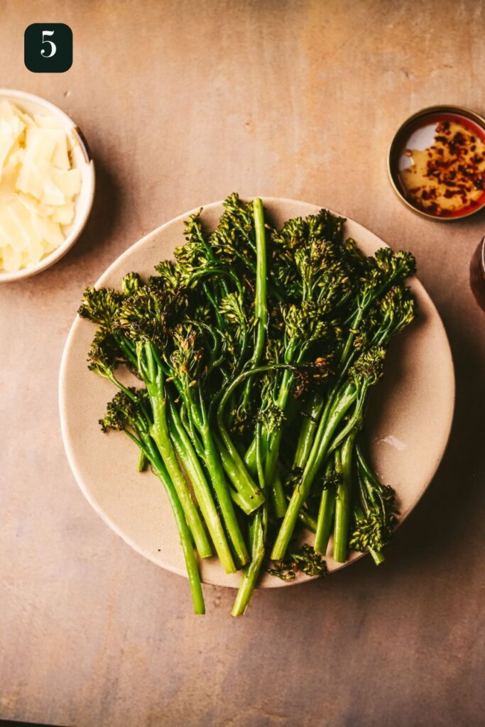 The broccolini on a plate. 
