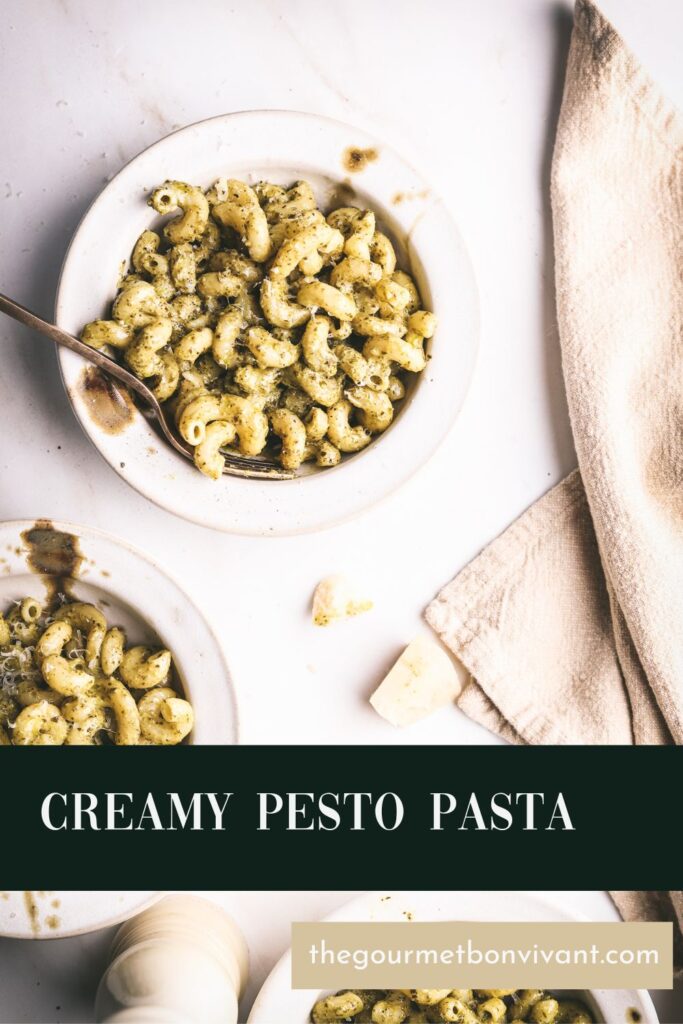Pesto pasta cream sauce with title text.