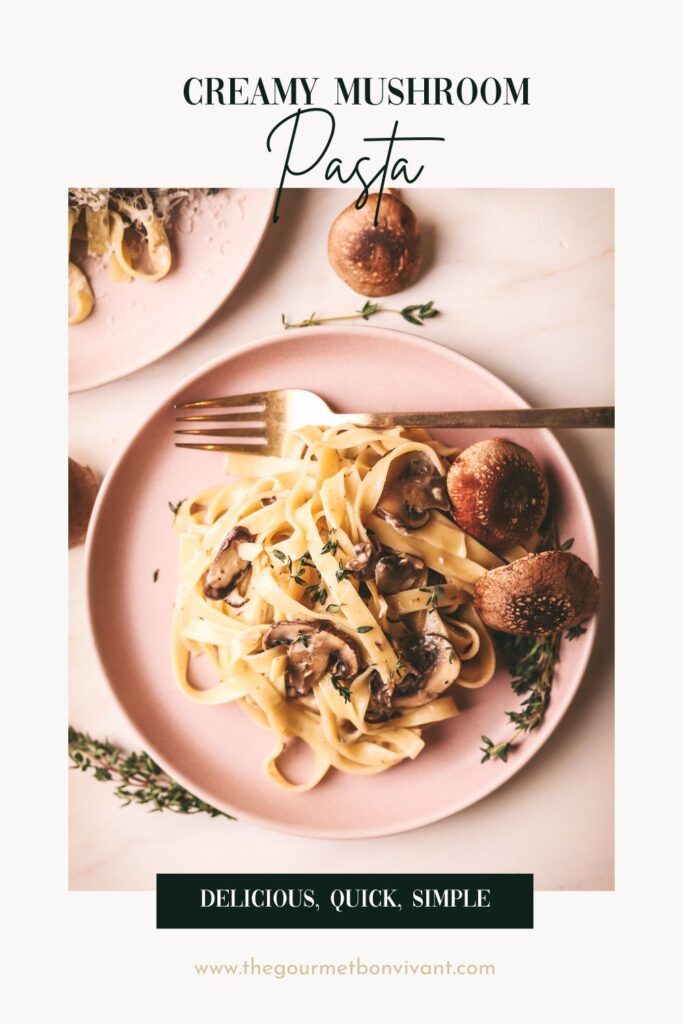 Creamy mushroom pasta with white wine sauce on white background with title text.