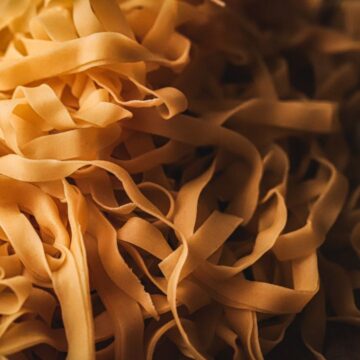 A pile of homemade fettucine pasta.