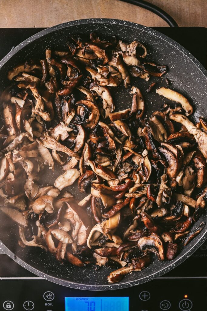 The mushrooms, now cooked down fully in the pan. 