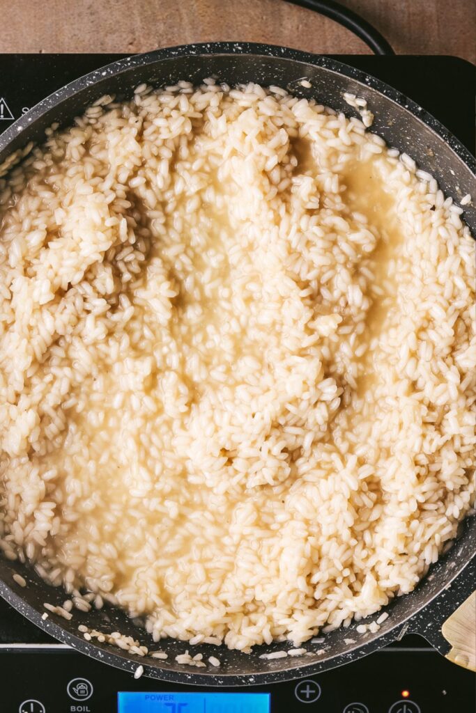 A shot of the risotto near the end of the cooking process. 