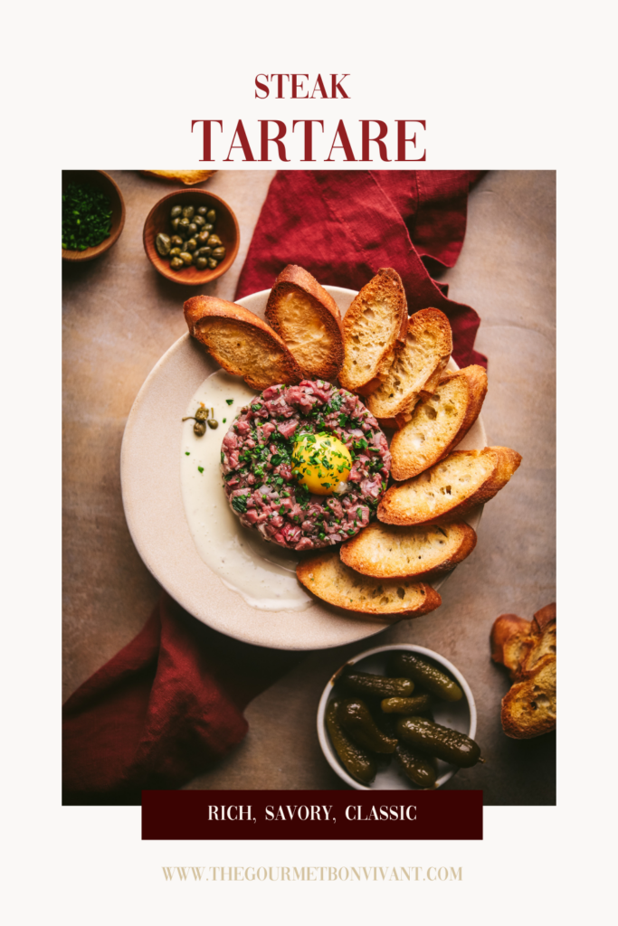 Steak tartare and toasted baguette on white background with title text.